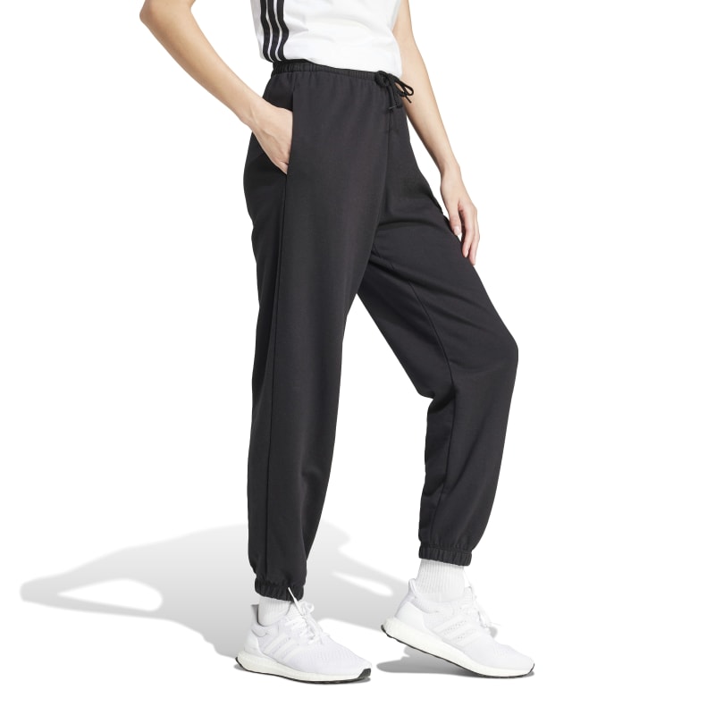 JD7999_5_APPAREL_On Model_Walking View_white Adidas Essentials Small Logo French Terry Cuffed Pants JD7999 – 3